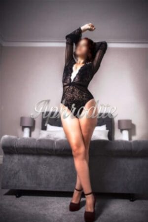 welsh Cardiff escort poses in her bedroom