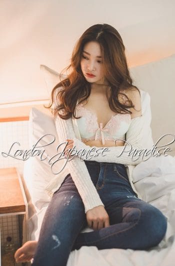 Lucy Taiwanese London Agency Escort shows her breasts