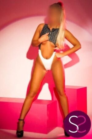 blonde Manchester escort in high rise pants