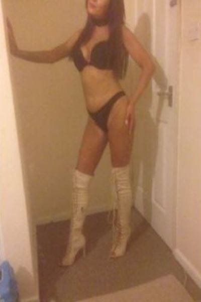 Birmingham escort in knee high white boots