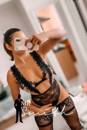 sexy Wrexham escort takes selfie in black underwear