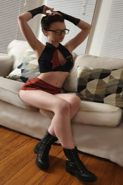 petite Swansea escort in skimpy tartan outfit