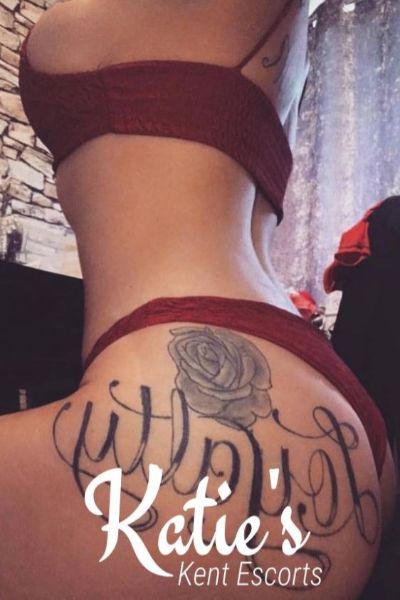 Kent escort with loyalty rose tattoo