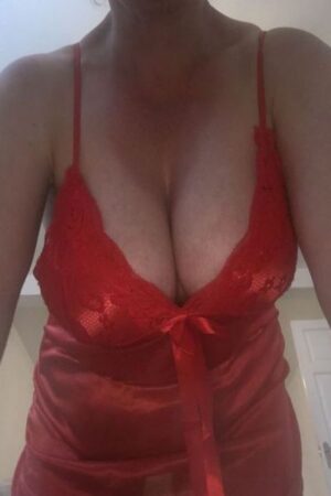 busty Pontypridd escort in red negligee
