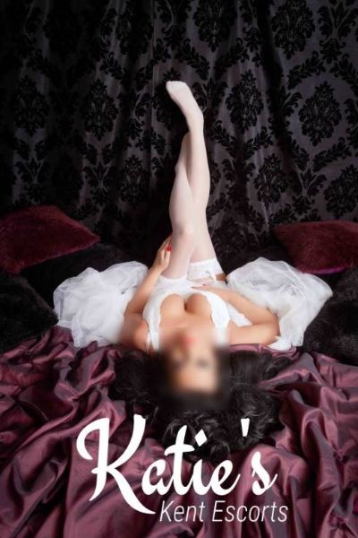 busty Kent escort in wedding dress