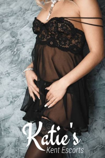 blonde Kent companion in black lingerie