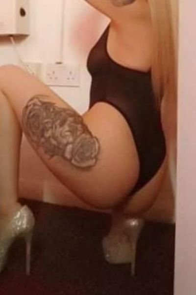 tattooed Bradford Escort with nice ass poses