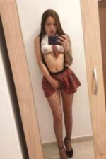 sexy and petite Fife escort dressed as a schoolgirl