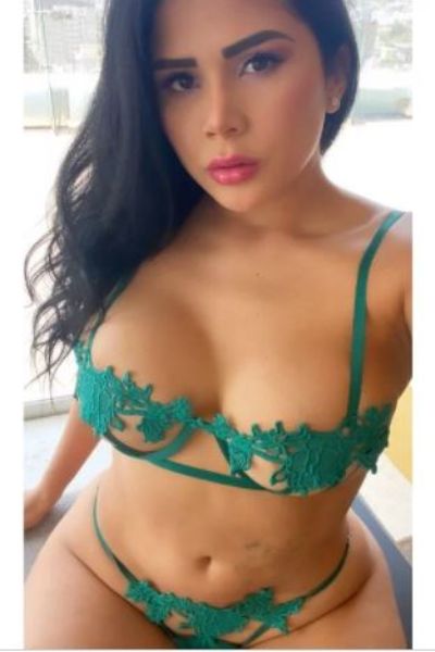 sexy curvy Blackpool escort in revealing green lingerie