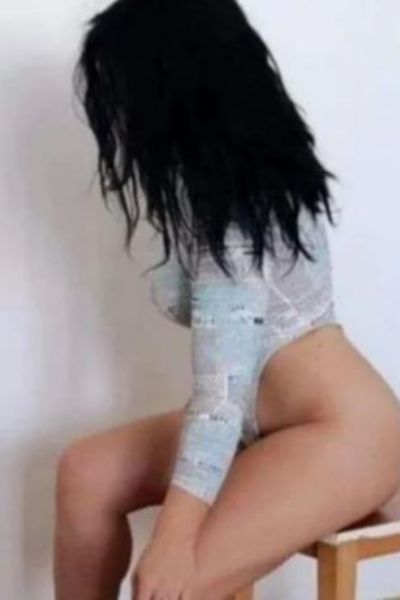 brunette Carlisle escort in leotard