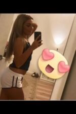 young blonde Hull escort takes a selfie in the mirror