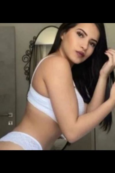 busty brunette Bradford Escort in tight lingerie