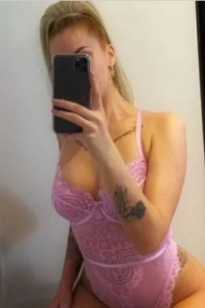 Colchester escort selfie with tattoo on her arm