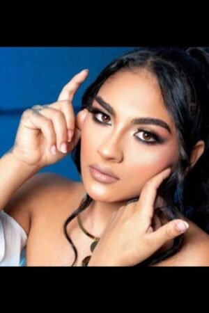 exotic looking Gloucester escort with hand tattoo