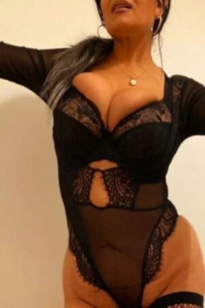 Independent Huddersfield escort in black long sleeve lingerie
