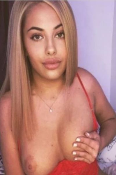 Blackpool escort cupping a tit