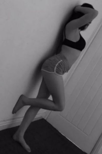 young Bolton escort in running shorts