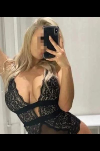 busty Aldershot escort in bustier taking selfie