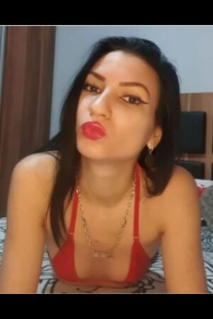 Leeds Escort with pouting red lips