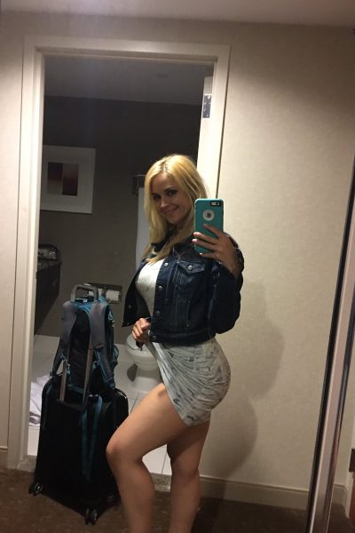 blonde Glasgow escort packed for travelling
