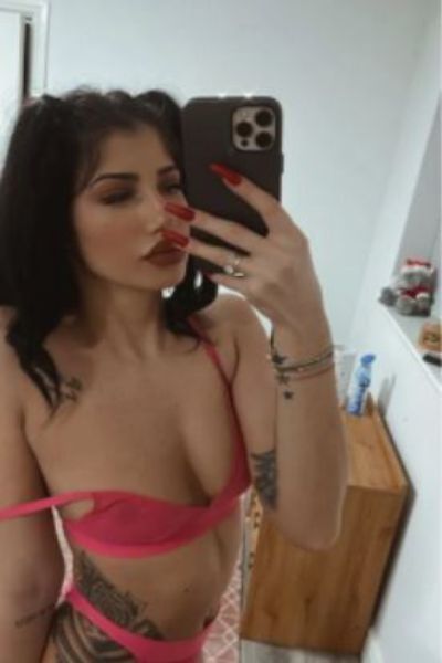 pouty tattooed Northampton escort