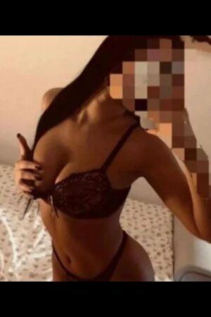 Preston escort taking a selfie cupping her breast