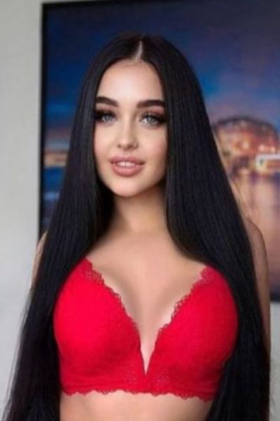 Cute Oxford escort in red lingerie
