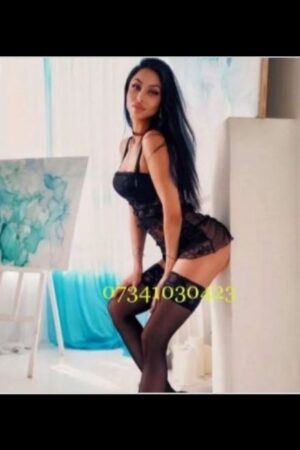 Wakefield escort in black lingerie posing