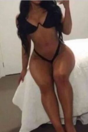 busty Walsall escort in black swimwear