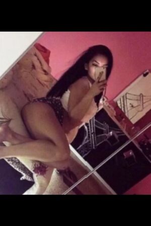 full bodied Walsall escort taking selfie on her bed
