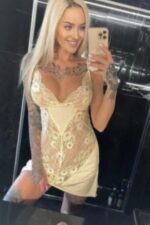 heavily tattooed Portsmouth escort taking a selfie
