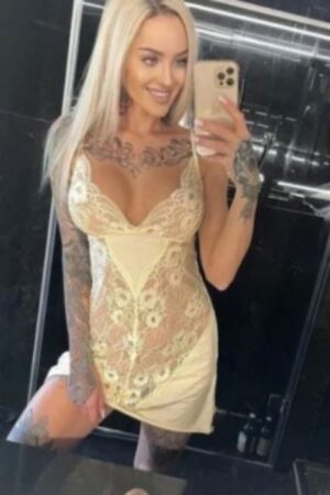 heavily tattooed Portsmouth escort taking a selfie