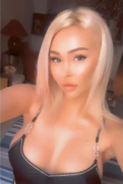 gorgeous blonde Portsmouth escort showing her cleavage