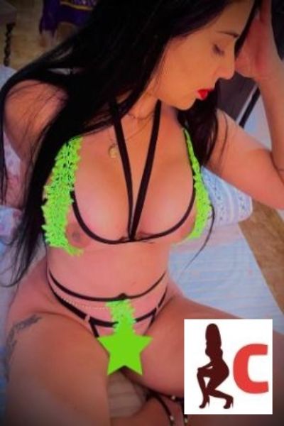 exotic Wexford escort in neon green strappy number