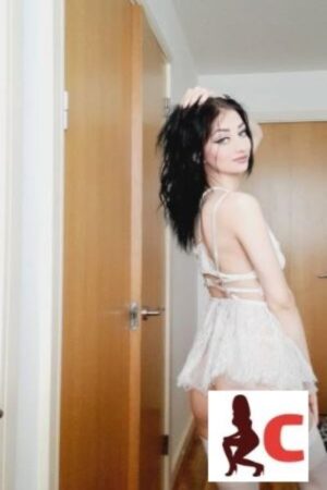 Louth escort with sexy makeup looking at camera