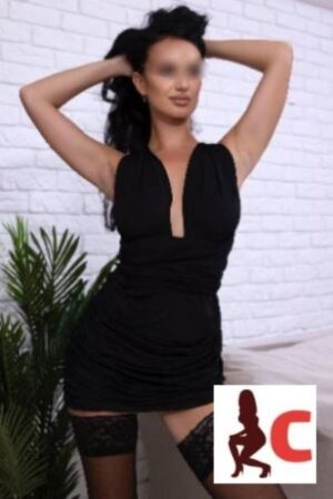 Brunette Kerry escort playing with hair