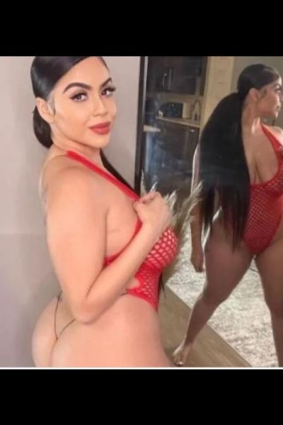 cute Wigan escort in red string bodice