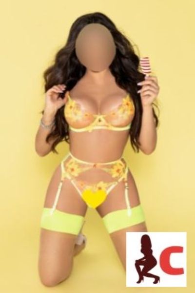 exotic erotic Derry companion posing in yellow