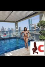 mocha Donegal escort posing by pool