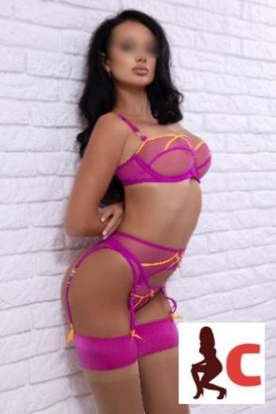 exotic Kerry escort in high end pink lingerie
