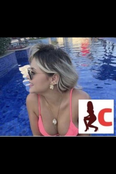 hot blonde Tyrone escort in a pool