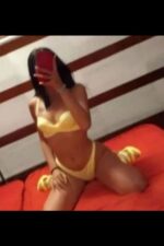yellow underwear on dark haired Belfast escort