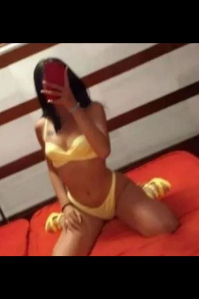 yellow underwear on dark haired Belfast escort