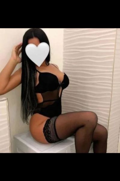 Belfast escort in black lingerie and nylons
