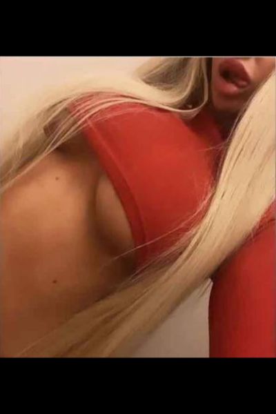 Blonde Midlothian Escort with enhanced breasts