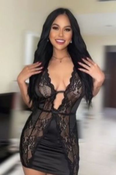 Stirling escort smiles in black lingerie