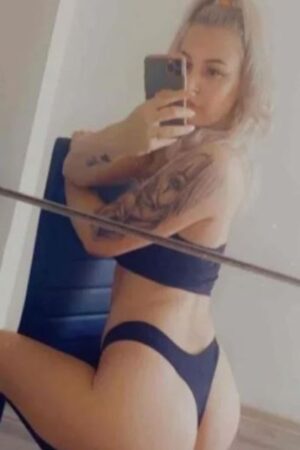 blonde Fife escort taking a selfie