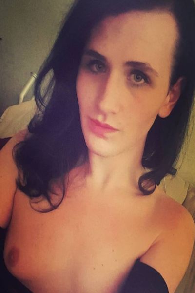 skinny South Ayrshire TV escort showing her breasts