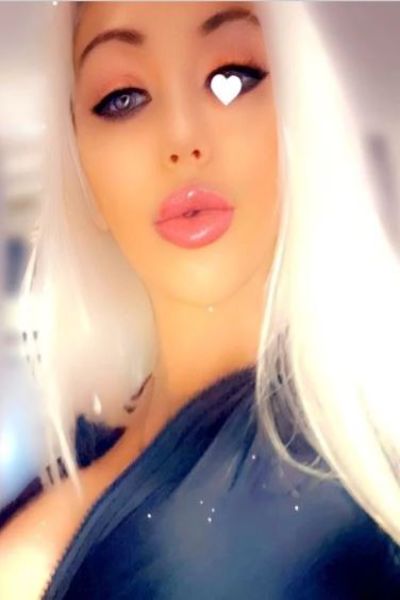 platinum blonde Blackburn companion with lip gloss