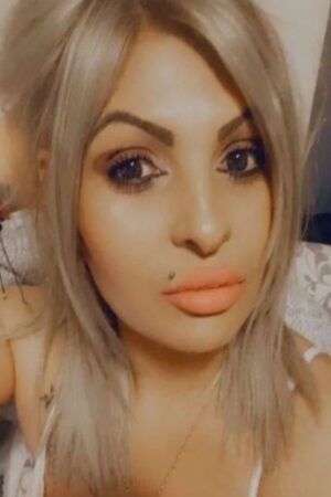 Newport escort with lip piercing